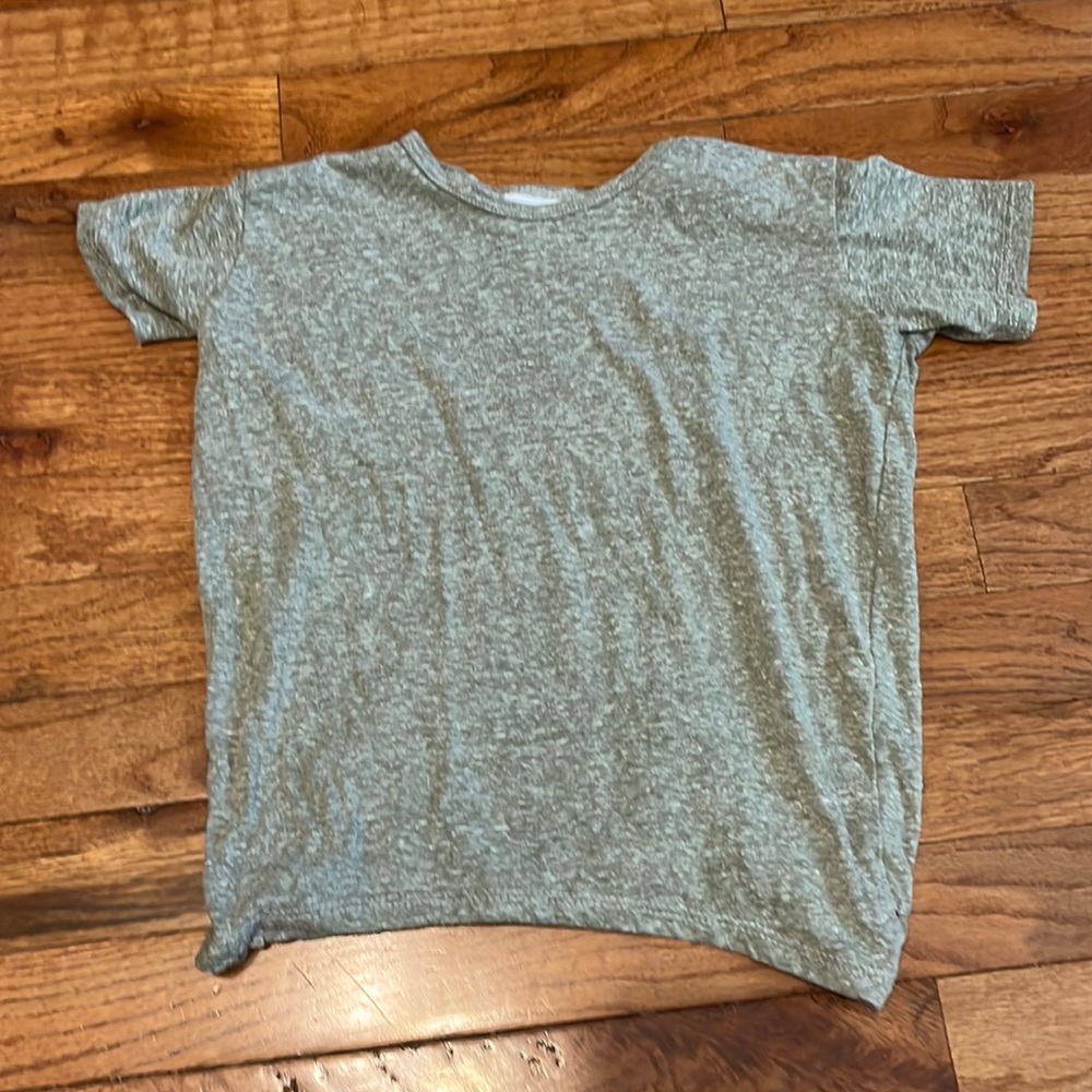 Gray shirt.
